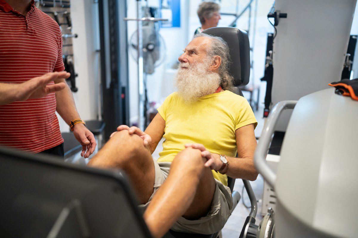 Older man participating in a rehabilitation exercise