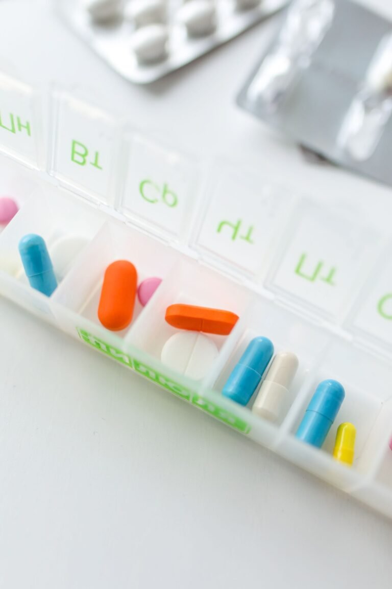 Weekly pill organizer with assorted medications