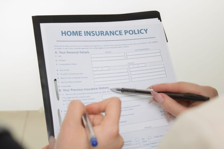 Insurance policy document displayed on a desk for review.