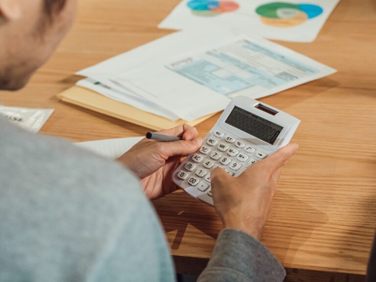Calculator and documents arranged for medical-expense review.