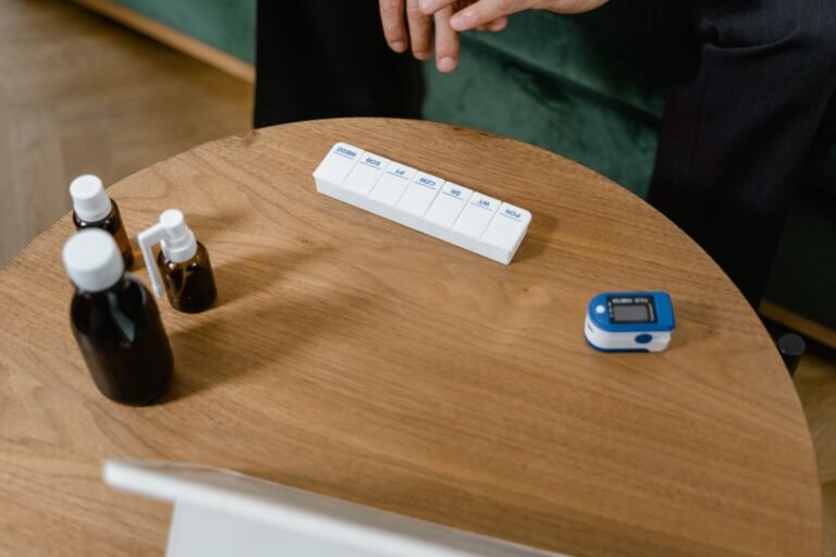 Medication organizer and medicine containers arranged on a table