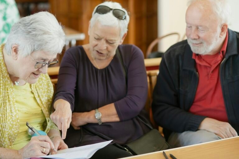 Older adults reviewing an important document together