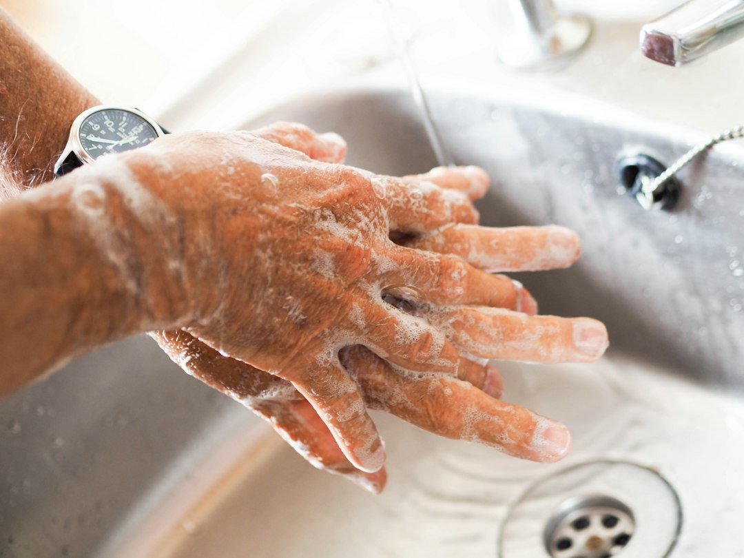 Hands being washed carefully for infection prevention