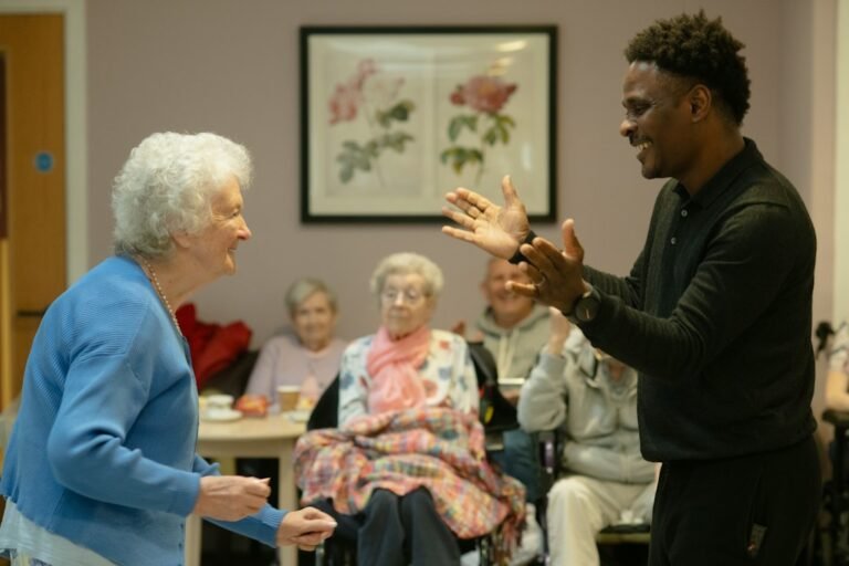 Older woman working with a caregiver during rehabilitation