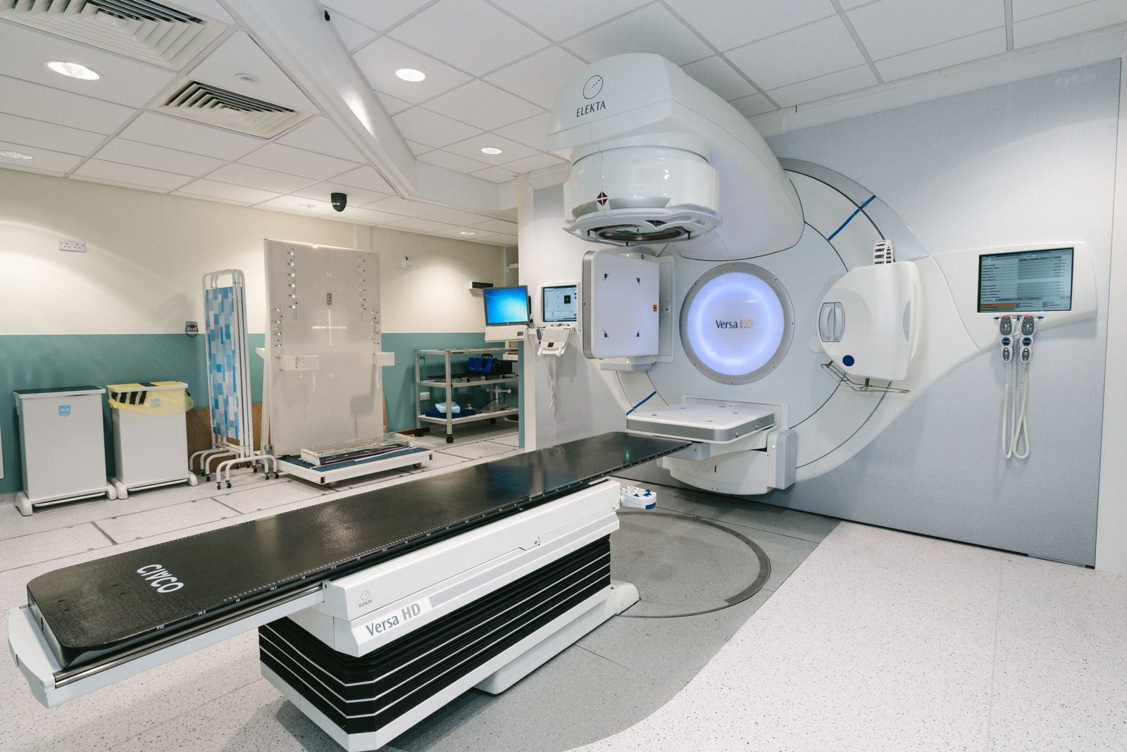 Empty radiotherapy treatment room with a medical treatment machine