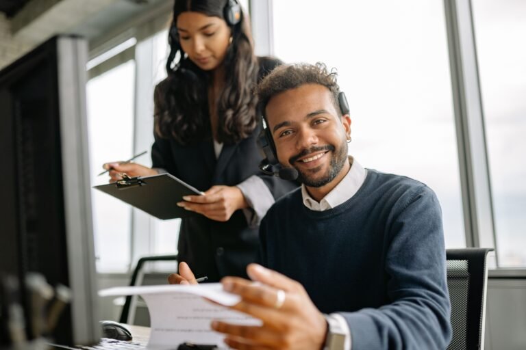 Customer-service professional wearing a headset during a coverage call.