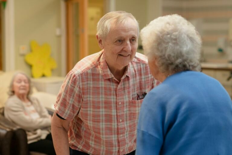 Older couple talking together in a senior living community